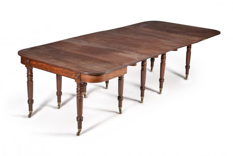 A George IV mahogany concertina action extending dining table, circa 1825