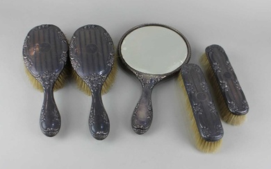 A George V silver five piece silver dressing table set