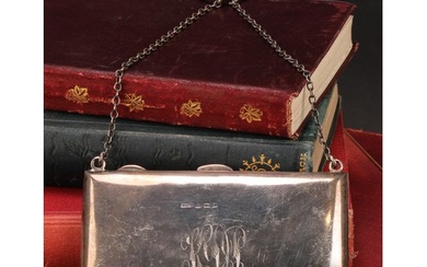 A George V silver rectangular aide memoir, hinged cover encl...