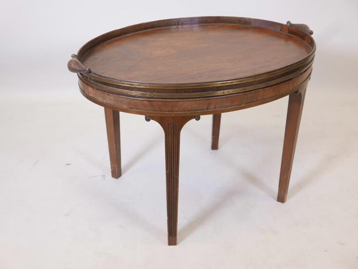 A Georgian brass bound mahogany oval gallery tray with...