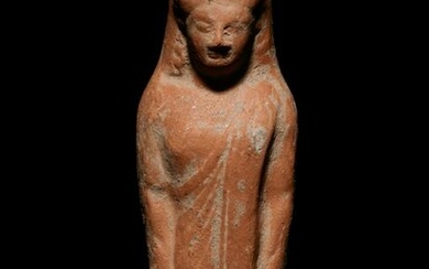 A Greek Terracotta Kore Height 5 7/8 inches.