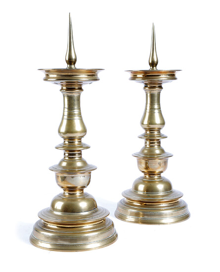 A LARGE PAIR OF BRASS PRICKET CANDLESTICKS