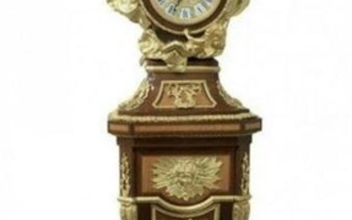 A LOUIS XVI STYLE ORMOLU MOUNTED CLOCK