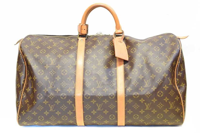 A Louis Vuitton monogram Keepall 55 luggage bag