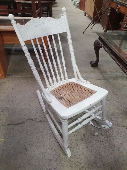 A PAINTED COLONIAL ROCKING CHAIR