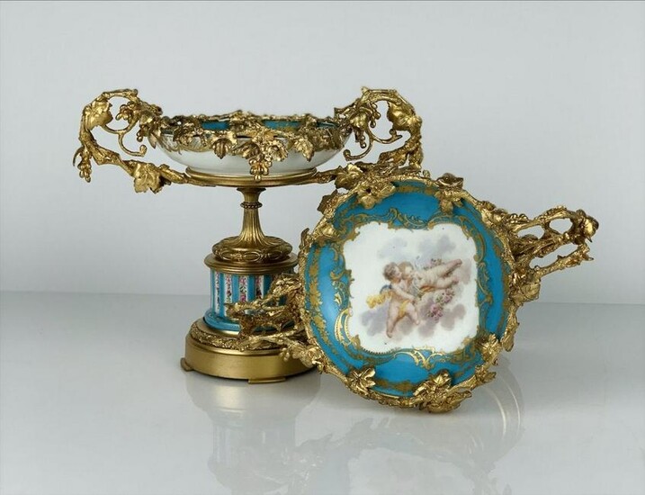 A PAIR OF DORE BRONZE MOUNTED SEVRES TAZZAS