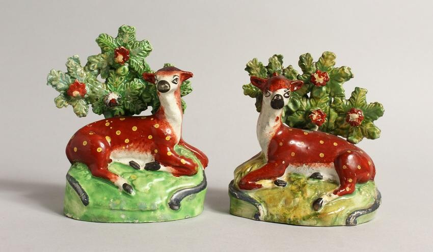 A PAIR OF STAFFORDSHIRE BOCAGE GROUPS OF RED DEER with