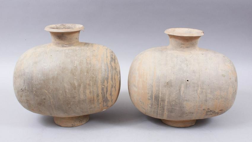 A PAIR OF UNUSUAL EARLY CHINESE BARREL SHAPED