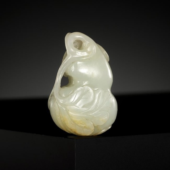 A PALE CELADON JADE 'DOUBLE GOURD' PENDANT, QING DYNASTY