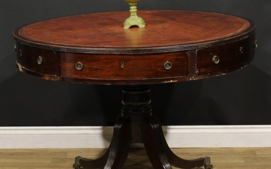 A Post-Regency mahogany drum table, circular top with reeded...