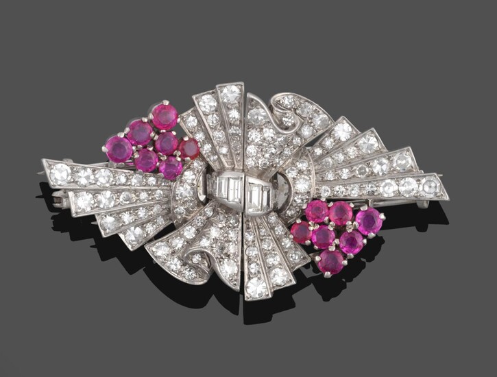 A Ruby and Diamond Double Clip Brooch, circa 1940's, formed of a bow motif centrally with spray...