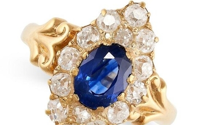 A SAPPHIRE AND DIAMOND RING in yellow gold, the navette