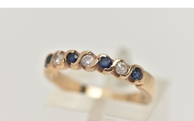 A SAPPHIRE AND DIAMOND SEVEN STONE RING, set with four circu...