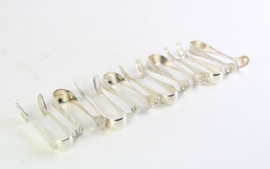 A Set of Eight Norwegian Silver Asparagus Serving Tongs