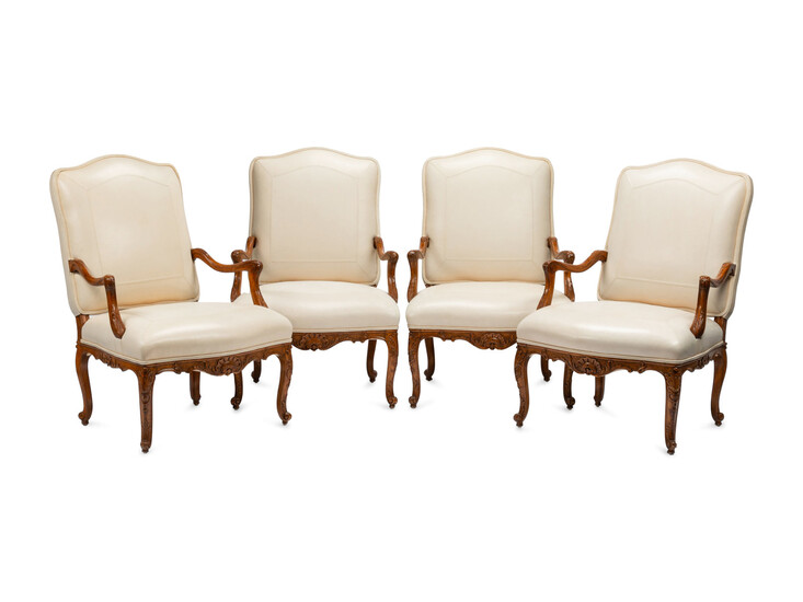 A Set of Four Régence Style Leather-Upholstered Armchairs