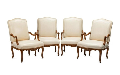 A Set of Four Regence Style Leather-Upholstered