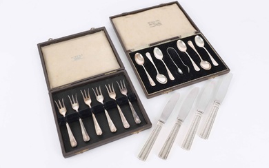 A box of crab spoons and a box of coffee spoons and four dessert knives, silver