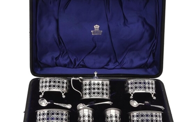 A cased seven piece cruet set by Haseler Brothers