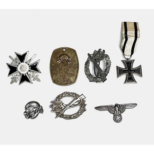 A collection of six WWII German Third Reich military badges ...