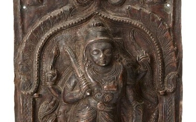 A copper repousse votive plaque with Shiva...