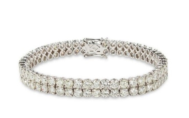 A diamond and eighteen karat white gold bracelet