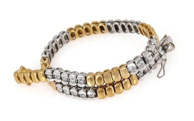 A diamond bracelet set with numerous brilliant-cut diamonds, mounted in 18k gold...