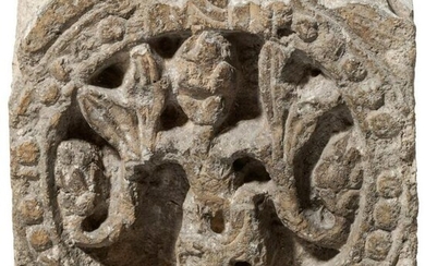 A fragment of a French Romanesque limestone frieze