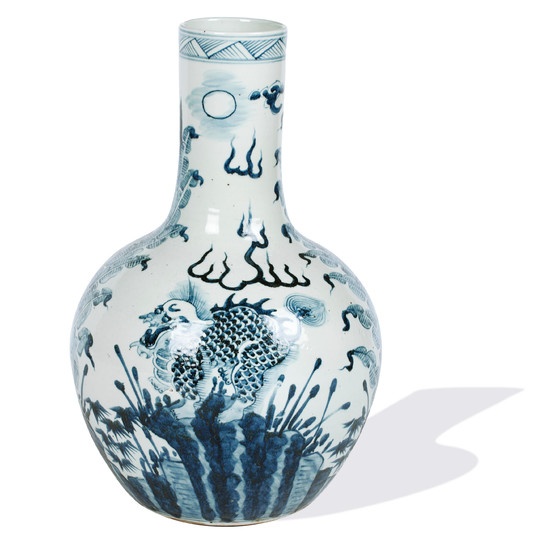 A large blue and white bottle vase