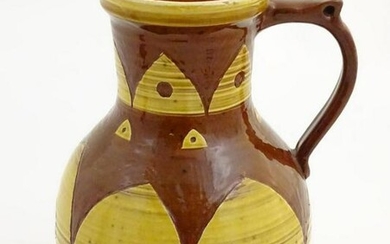 A large earthenware studio pottery baluster vase / jug