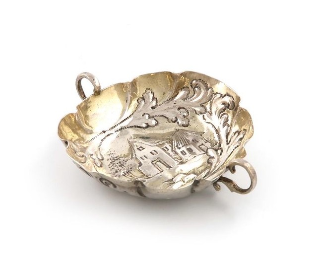 A late 17th century German parcel-gilt silver two-handled...