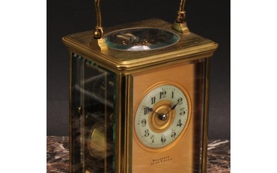 A late 19th century lacquered brass carriage clock, the gilt...