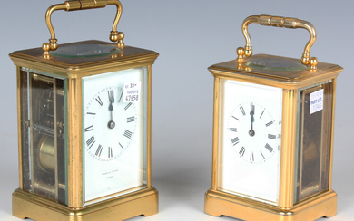 A late 19th century/early 20th century French lacquered brass carriage clock with eight day movement