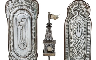 A late 19th/early 20th century Austro-Hungarian silver spice tower (besamim), Brno/Brunn, 1872-1921, maker's mark EE, 800 standard, of typical form with openwork square body to tapering turret surmounted by a flag, the square base raised on four...