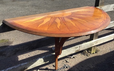 A mahogany & oak folding demi-lune console table with sunburst...