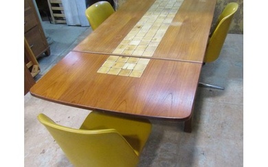 A mid 20th century G plan teakwood extending drop leaf table...