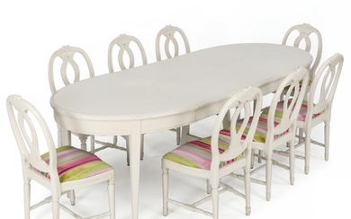 A painted Gustavian style dining table and eight chairs. Sweden, late 20th...