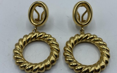 A pair of 18k gold marked clip earrings. 17.8g.