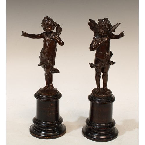 A pair of 19th century bronze figural spill vases, standing ...
