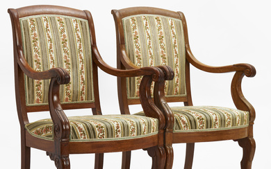 A pair of French 19th century mahogany armchairs.