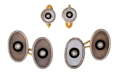 A pair of diamond cufflinks and dress studs, c. 1910, designed as oval mother-of-pearl plaques each centring on a circular-cut diamond with onyx surround to dog clip connections and a pair of matching circular dress studs