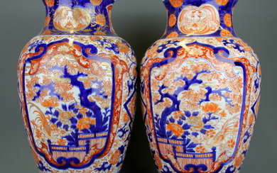 A pair of large 19th Century Japanese Imari vases, H. 40cm.