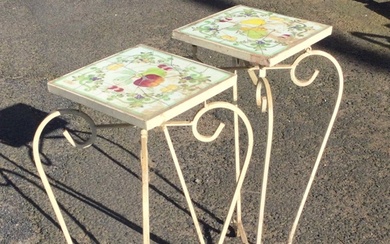 A pair of wrought iron plant stands with square handpainted...