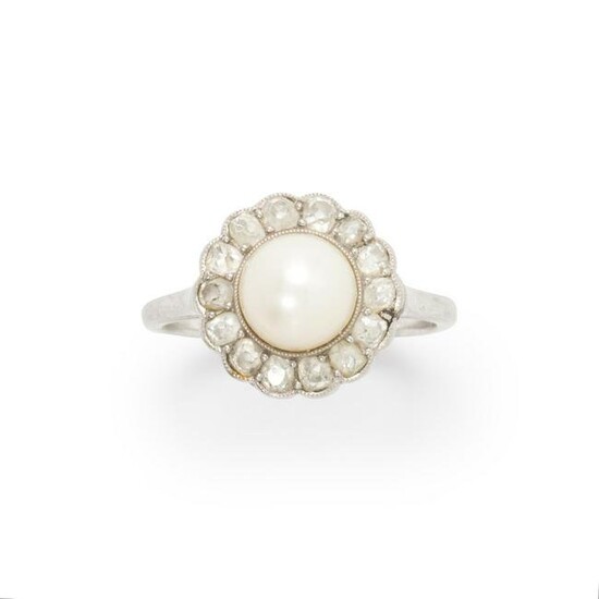 A pearl, diamond and platinum ring