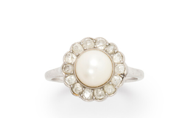 A pearl, diamond and platinum ring