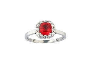 A red spinel and diamond cluster ring The...