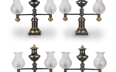 A set of four William IV gilt and patinated bronze twin-light Colza lamps
