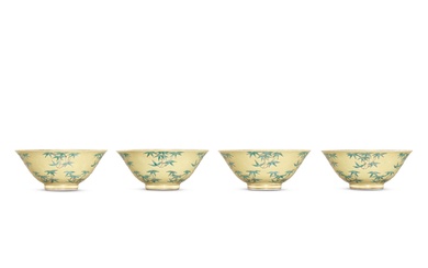 A set of four yellow-ground green-enamelled 'bamboo' cups, Mark and...