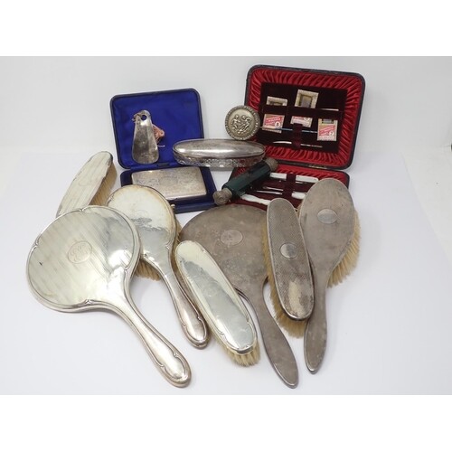 A silver backed Dressing Table Set, cased Manicure Set, engr...