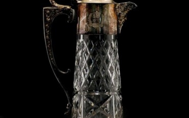 A silver mounted cut crystal claret jug