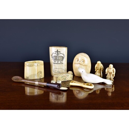 A small collection of antique bone and ivory curiosities, to...